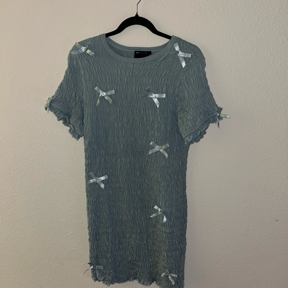 Textured Light Blue Dress with Bow Accents